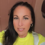 Portrait of Kerry Vadasz wearing a high-visibility shirt.