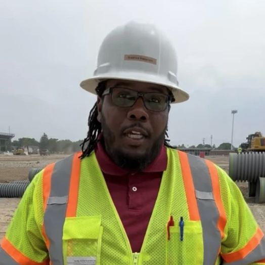 Maurice Hampton Maurice Hampton wearing a hard hat and safety vest